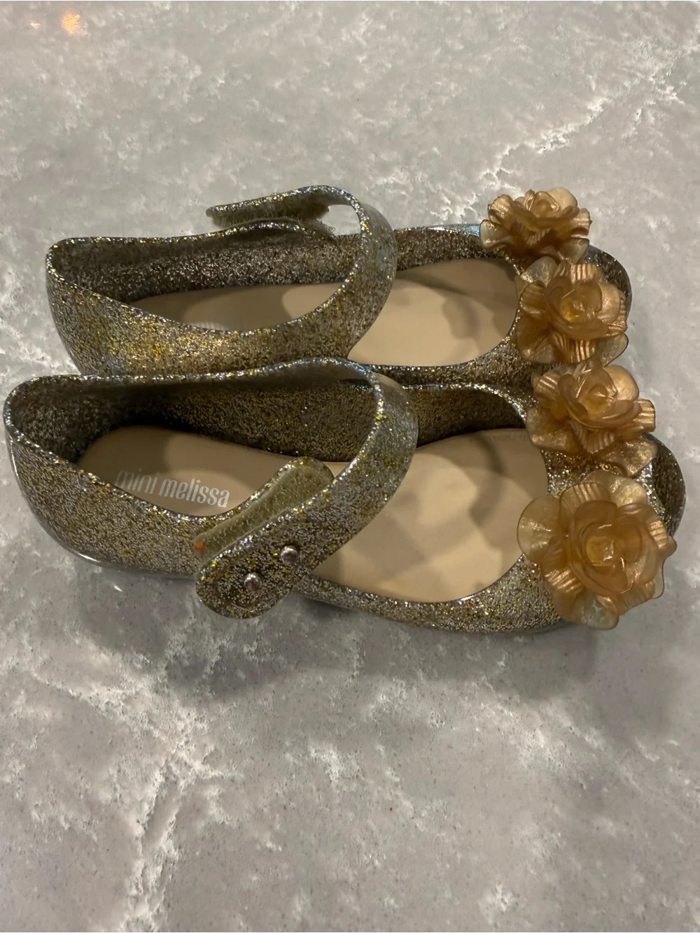 Mini Melissa Girls Gold Glitter Mary Jane Shoes with Champagne Flower Like New